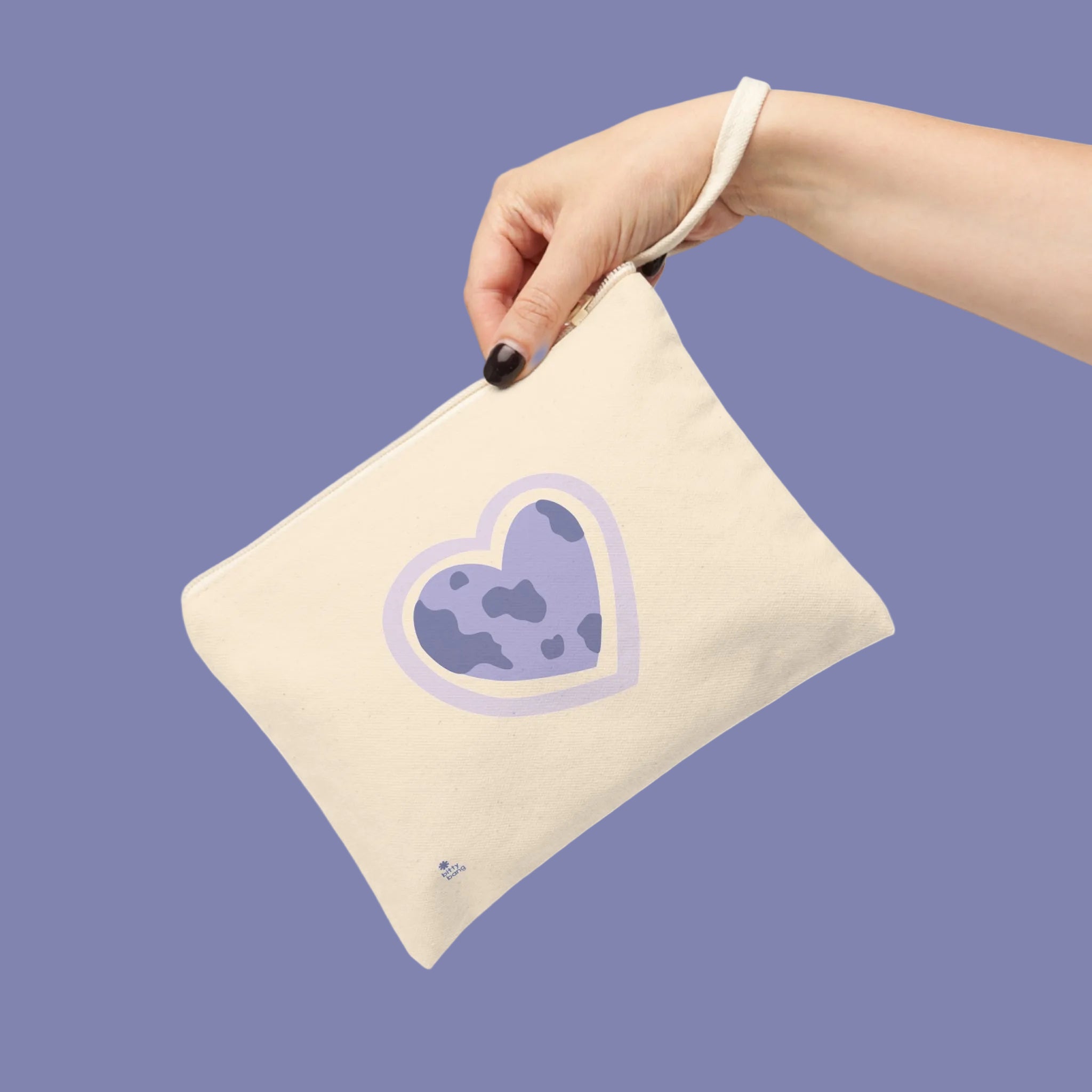 Natural cotton cream canvas travel pouch for sale with a custom design purple earth heart icon