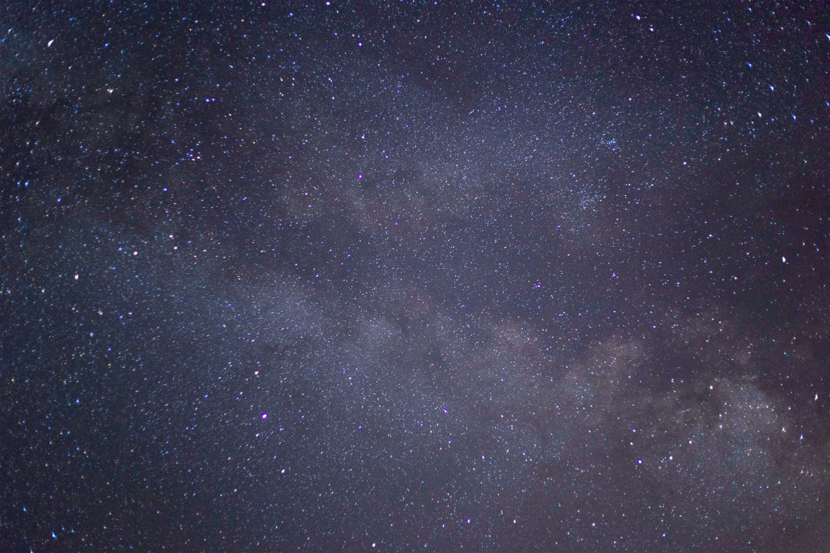 purple night sky full of beautiful stars